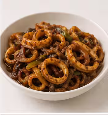 Deviled cuttlefish stir-fried with peppers and onions