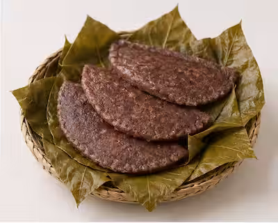 Halapa, a steamed kurakkan flour sweet wrapped in a leaf