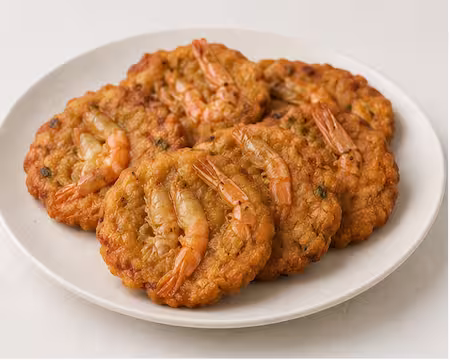 Isso wade, a lentil fritter topped with a whole prawn