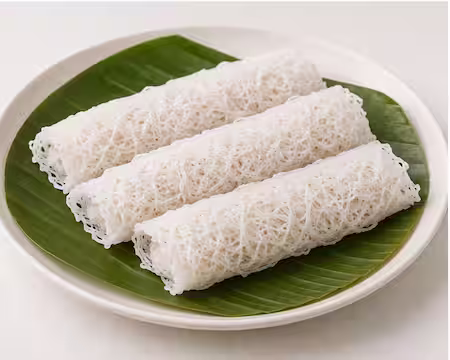 Lavariya, string hoppers stuffed with a coconut and jaggery filling
