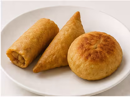 An assortment of Sri Lankan short eats snacks on a tray